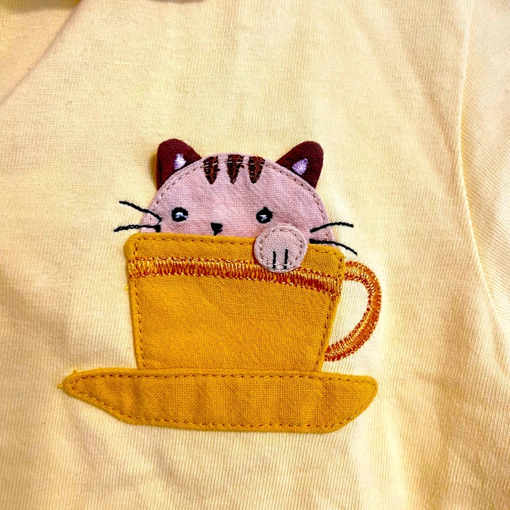 Hikosen Cara Yellow Cat in a Teacup Kid’s Pocket Polo Shirt -size M